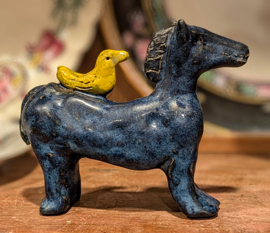 Blue horse yellow bird